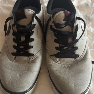 Nike Black and White Sneakers with Low-Top Design